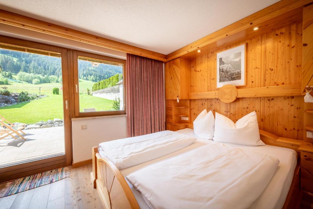 Ліжко або ліжка в номері Eden Appartements