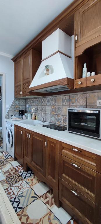 Kuchyň nebo kuchyňský kout v ubytování Villa Kaldera Skiathos