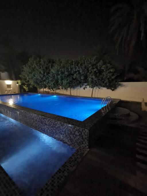 Bazén v ubytování ALWADI Chalet - Khorfakkan nebo v jeho okolí