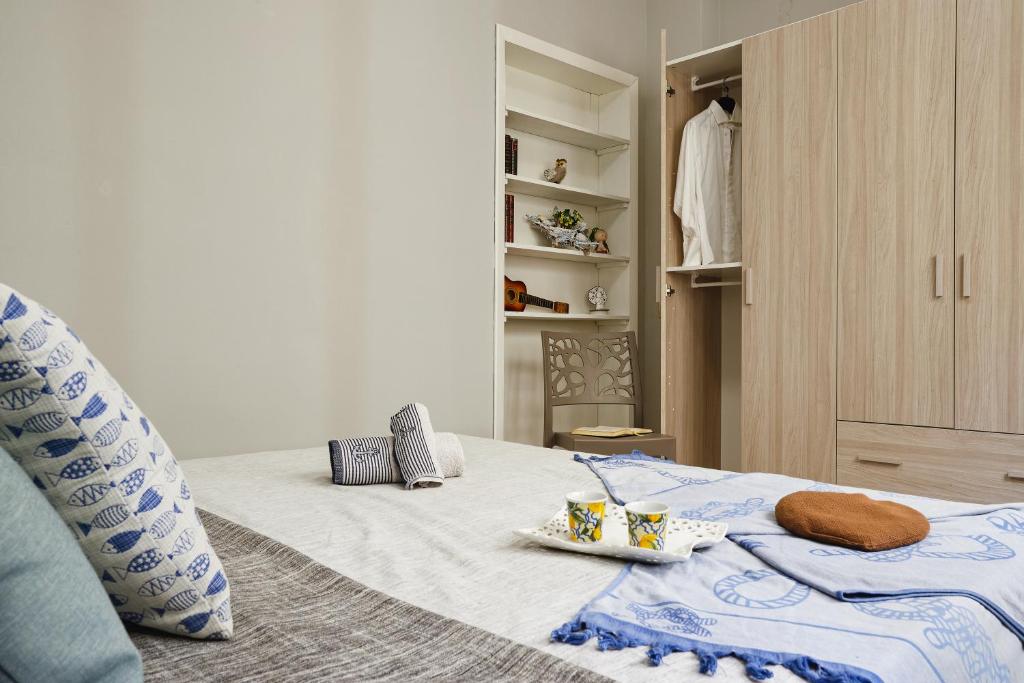 Łóżko lub łóżka w pokoju w obiekcie Aurora casa vacanze