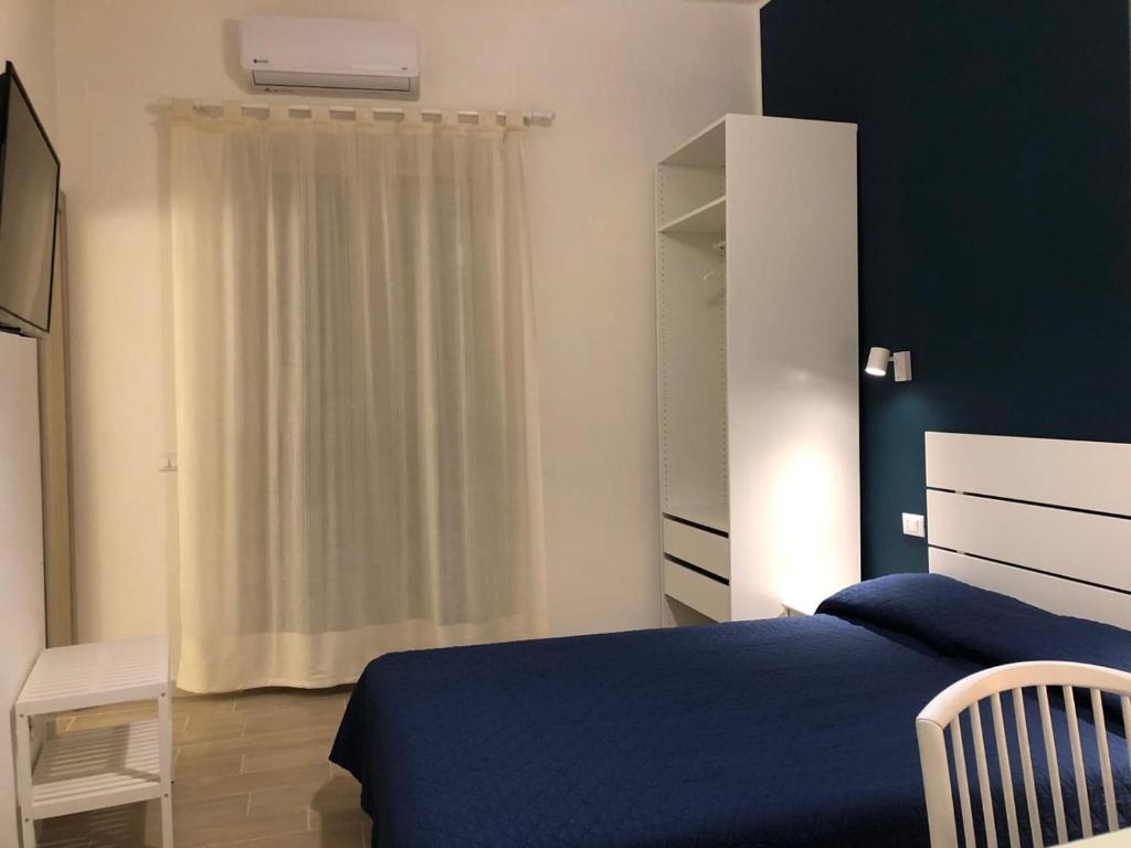 Postel nebo postele na pokoji v ubytování Kalé Atenea