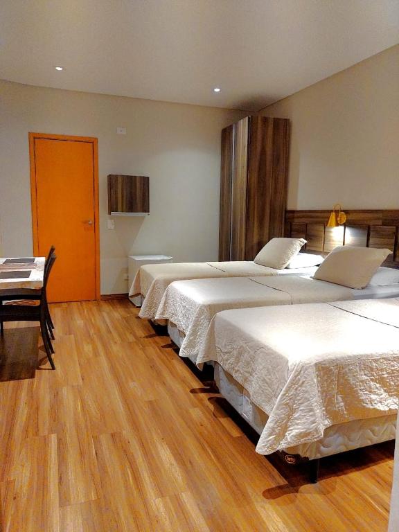 Postel nebo postele na pokoji v ubytování Guess Hotel & Motel