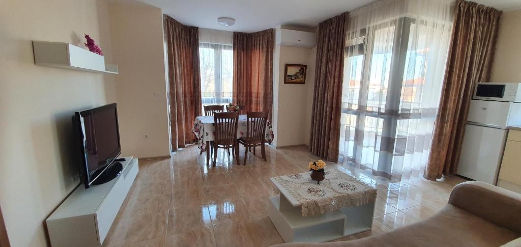 TV a/nebo společenská místnost v ubytování Luxury Apartments Ekaterina