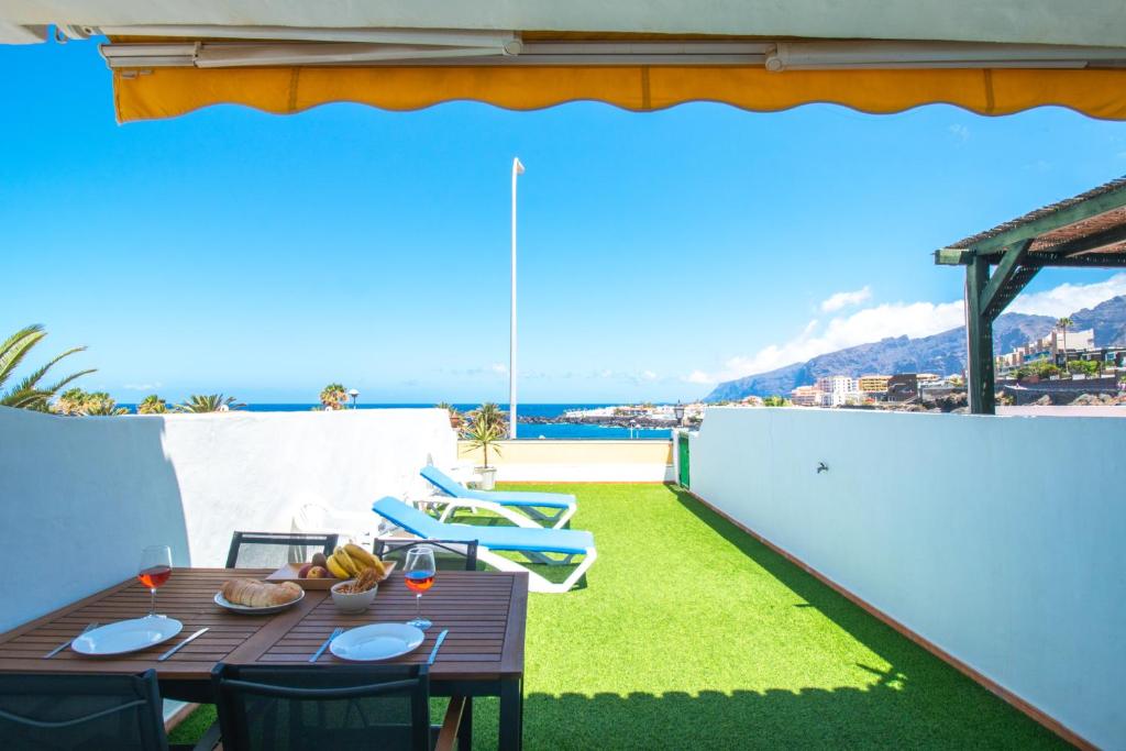 Kép El Varadero Grande terrasse ensoleillée face à la mer szállásáról Puerto de Santiagóban a galériában