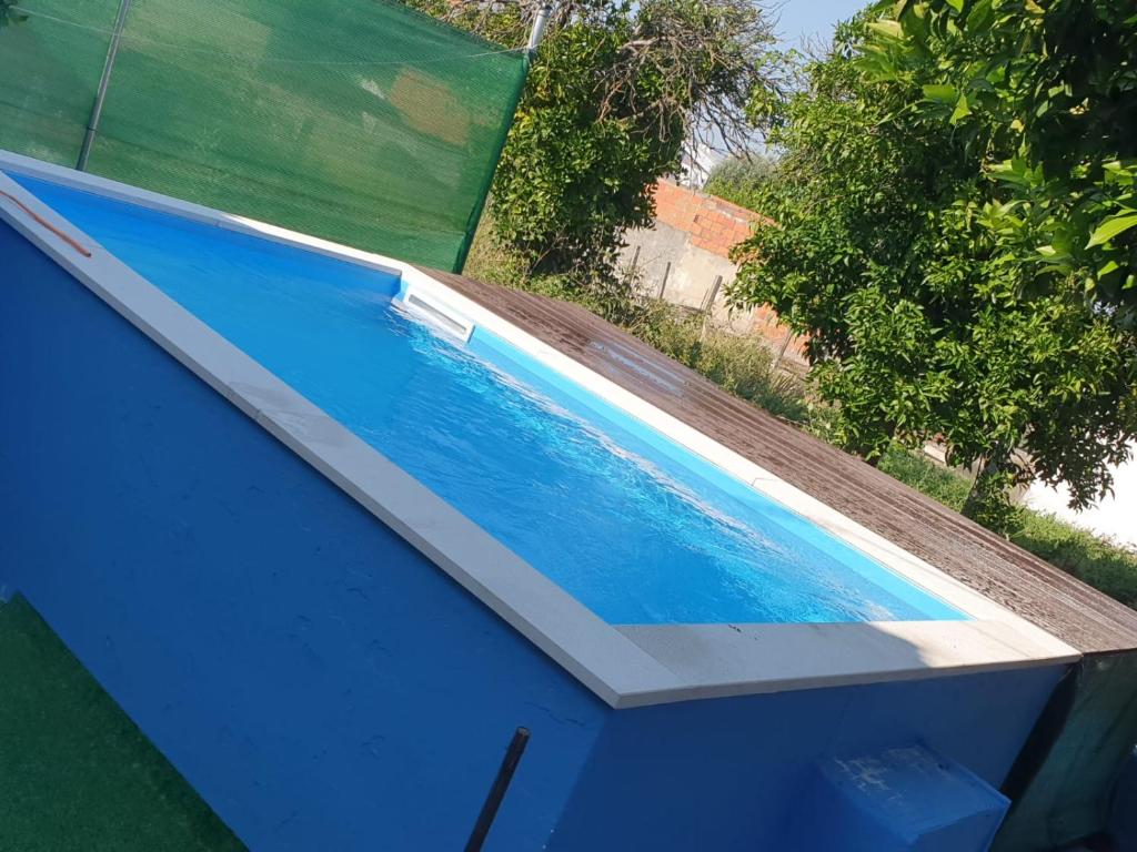 Swimming pool sa o malapit sa Casa Mendonça