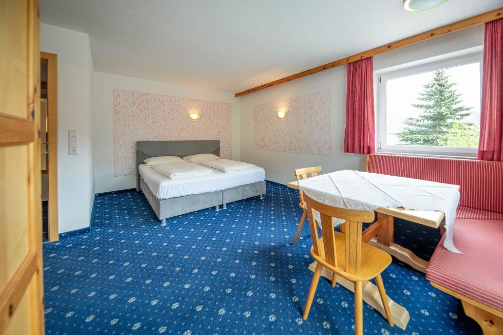 Postel nebo postele na pokoji v ubytování B&B 2000 - Panorama Pension