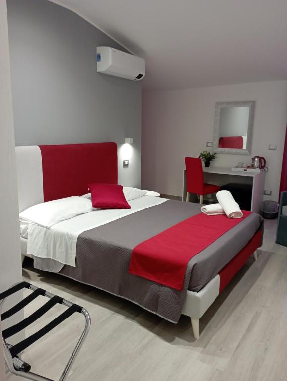 A bed or beds in a room at B&B Civico 64 Scalea