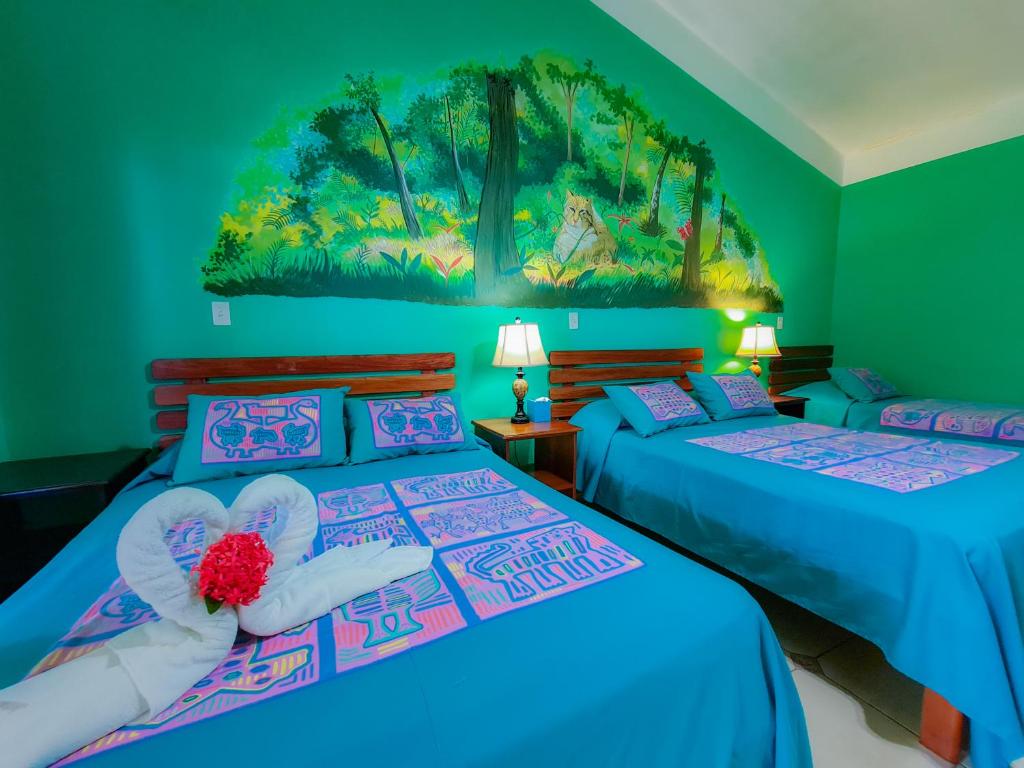 Postel nebo postele na pokoji v ubytování Las Lajas Beach Resort
