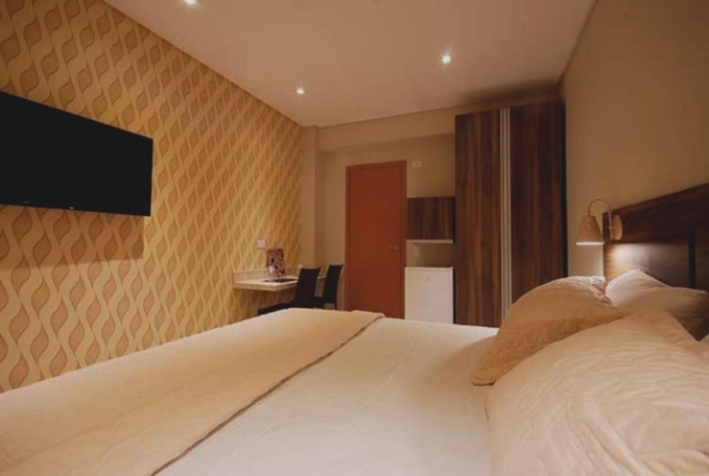 Postel nebo postele na pokoji v ubytování Guess Hotel & Motel