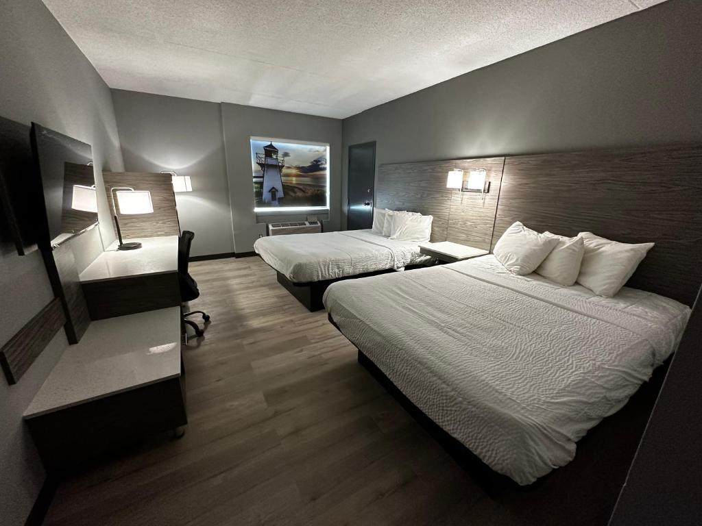Postel nebo postele na pokoji v ubytování Days Inn & Suites by Wyndham Summerside