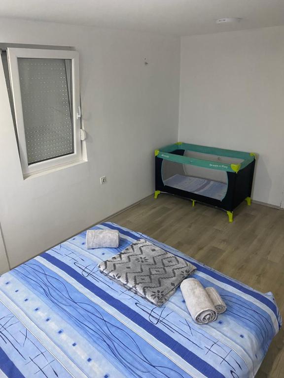 Postel nebo postele na pokoji v ubytování Iskra DDUR