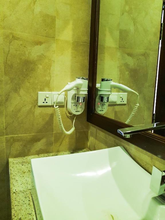Koupelna v ubytování Galaxy City Hotel