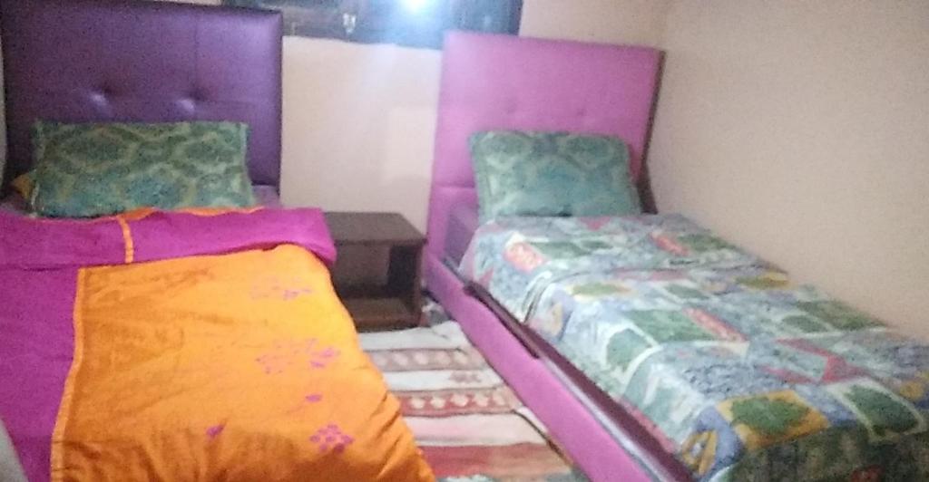 Postel nebo postele na pokoji v ubytování Farm Stay Mharchen