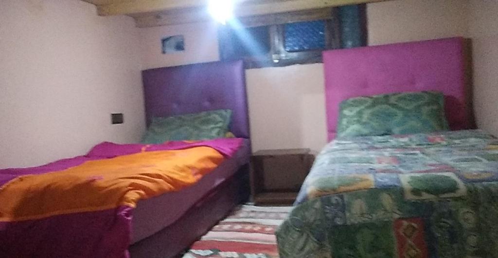 Postel nebo postele na pokoji v ubytování Farm Stay Mharchen