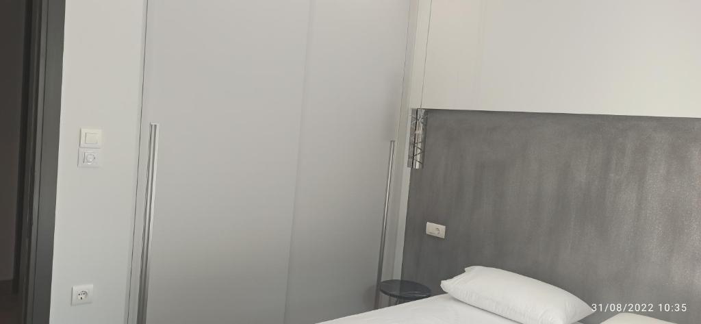 A bed or beds in a room at ERODIOS TOWN