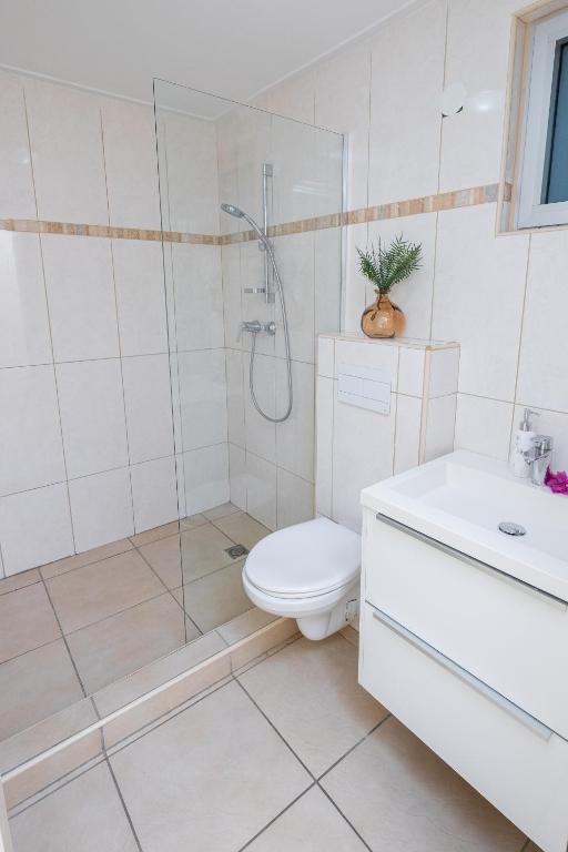 Koupelna v ubytování Droom appartement met uitzicht op de jachthaven