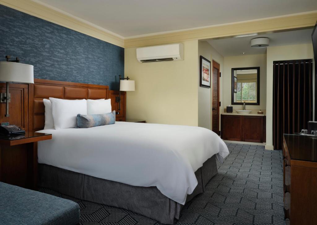 Een bed of bedden in een kamer bij Hotel Abrego