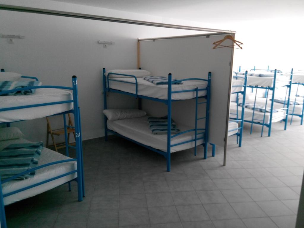 Postel nebo postele na pokoji v ubytování Albergue @ Muxia