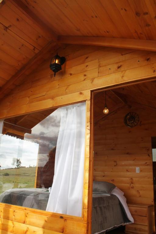 Postel nebo postele na pokoji v ubytování Camping San Francisco - Cabaña, Teepee & Zona de Camping