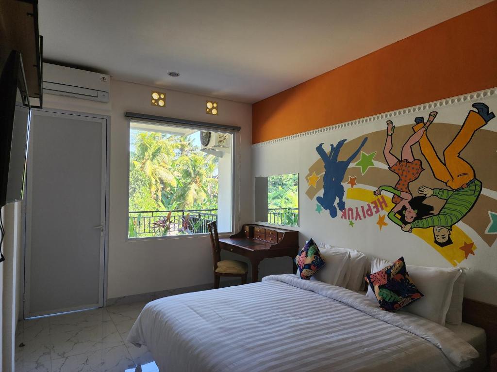 Postel nebo postele na pokoji v ubytování Hepi Yuk Ubud Luxury Guesthouse