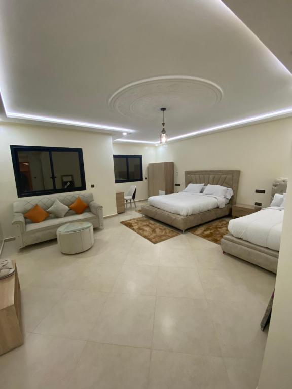 Letto o letti in una camera di Le ruban d’or