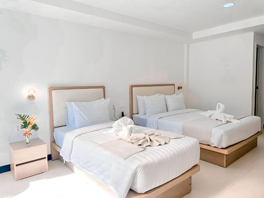 Postel nebo postele na pokoji v ubytování 라메디 리조트 보홀 Ramede Resort Bohl