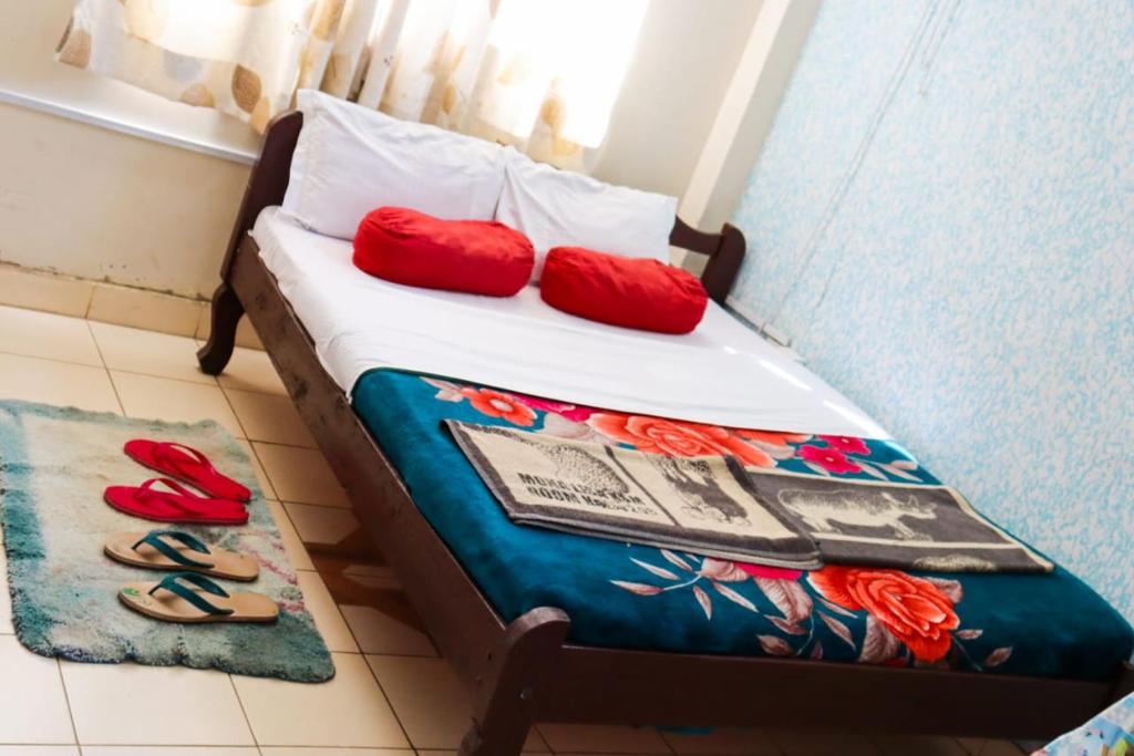 Voodi või voodid majutusasutuse Mona Lisa Guest House, Kisumu toas