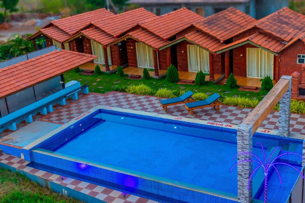 Bazén v ubytování Rofinos Cottages nebo v jeho okolí