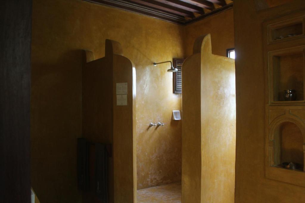 Vannituba majutusasutuses Kijani Hotel