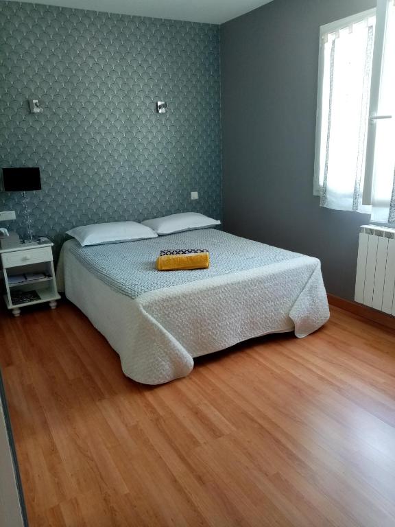 Postel nebo postele na pokoji v ubytování 2 Chambres avec piscine et spa au calme, mer à proximité.