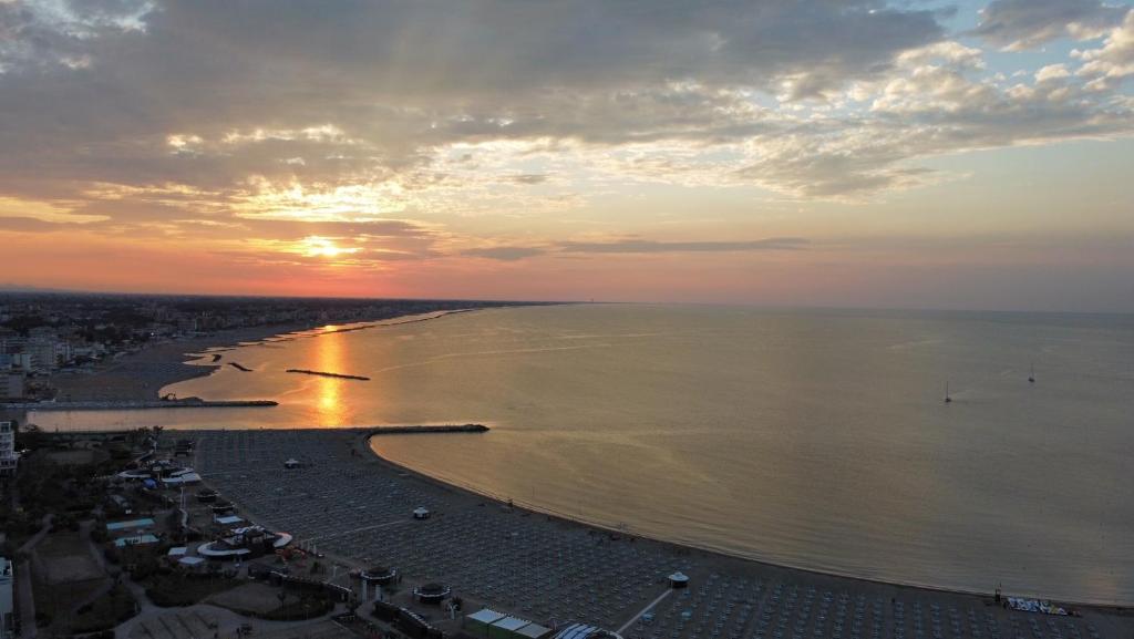 an aerial view of a beach at sunset at Hotel St Gregory Park in Rimini