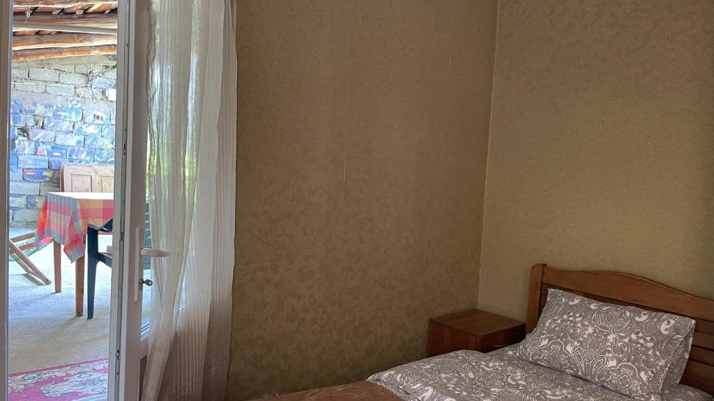 Postel nebo postele na pokoji v ubytování Guesthouse Chela