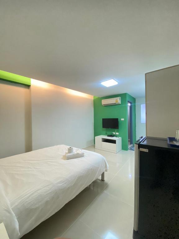 Postel nebo postele na pokoji v ubytování PDA Lord Hotel