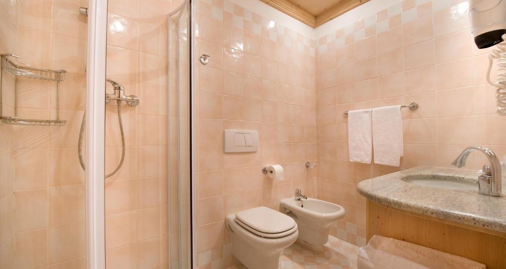 Kúpeľňa v ubytovaní Boscone Suite Hotel