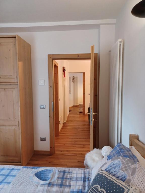 Postel nebo postele na pokoji v ubytování Appartamento Valmaor