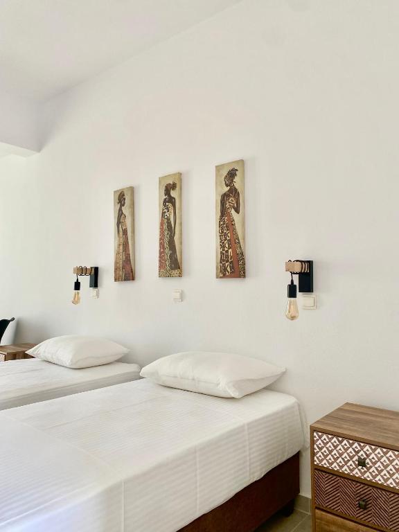 Postel nebo postele na pokoji v ubytování Fikas Hotel