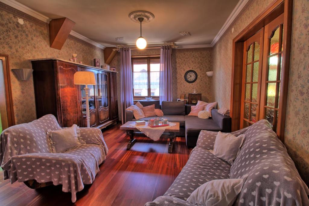 Posezení v ubytování Appartements & Chambres Les Loges du Capucin