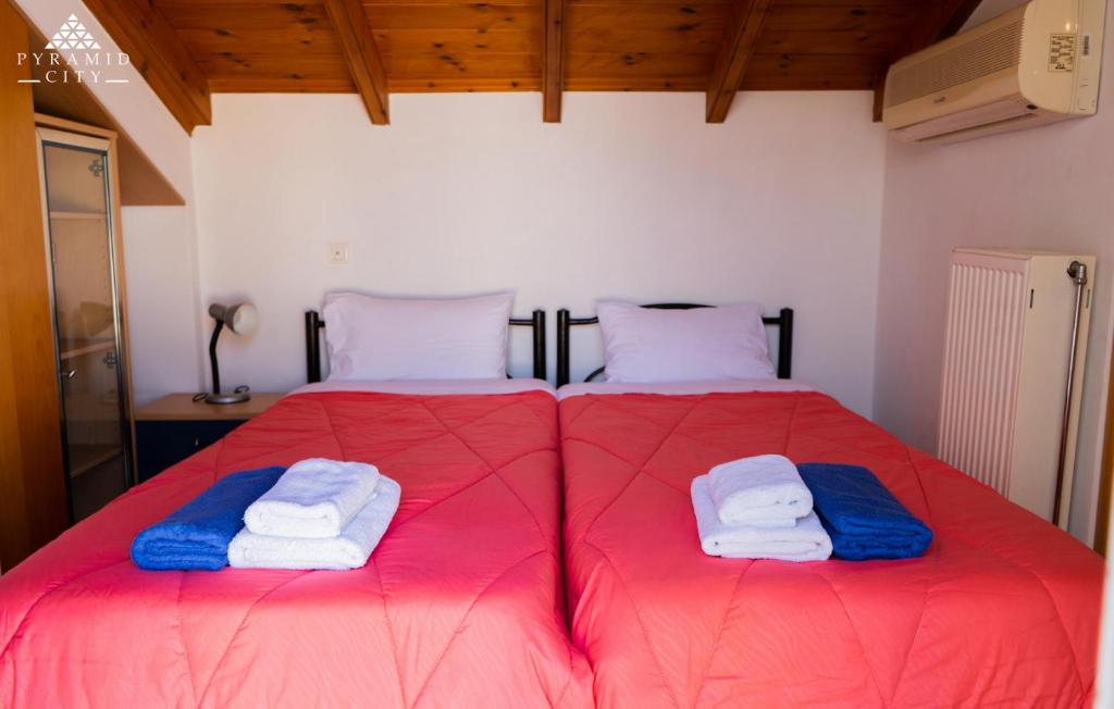 Postel nebo postele na pokoji v ubytování Villa Poseidon
