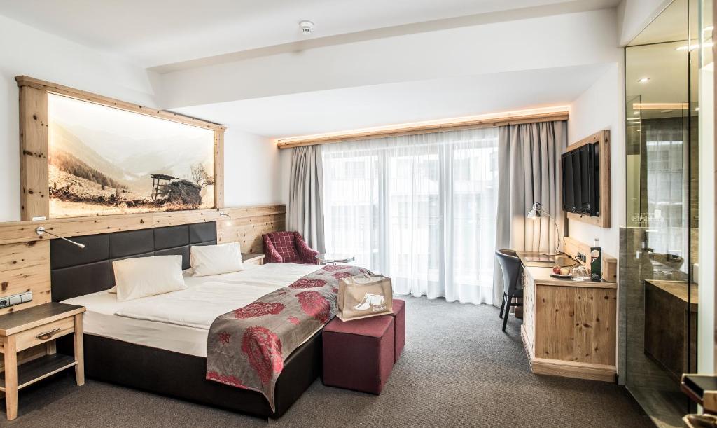 Postel nebo postele na pokoji v ubytování Hotel Elisabeth, 4 Sterne Superior