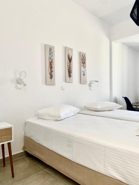 Postel nebo postele na pokoji v ubytování Fikas Hotel