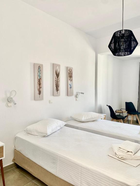 Postel nebo postele na pokoji v ubytování Fikas Hotel
