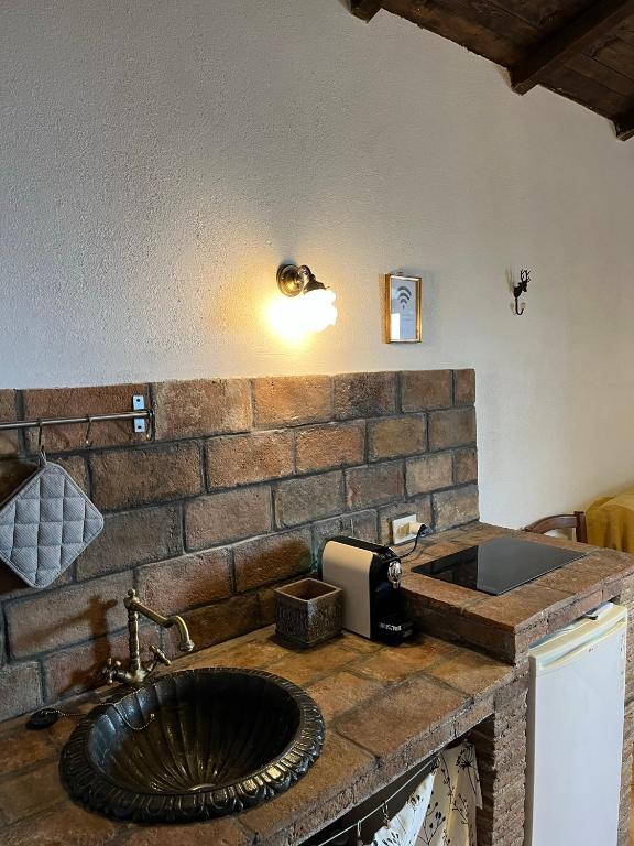 Kuchyň nebo kuchyňský kout v ubytování La Taberna di Rocca Calascio