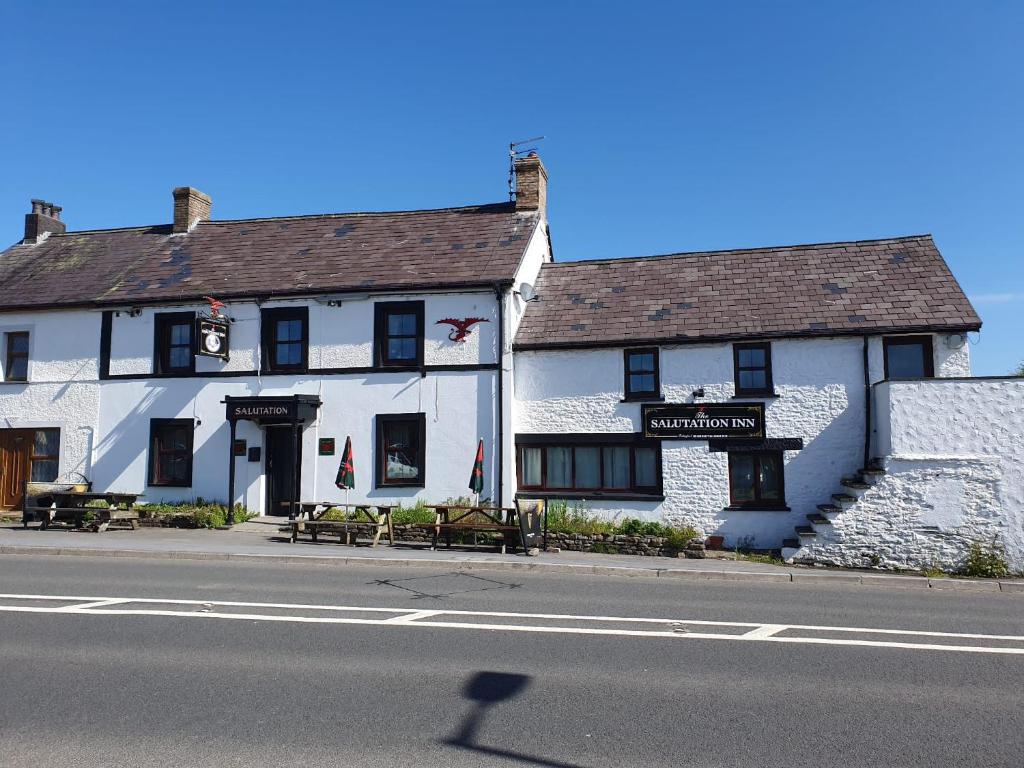 a white building on the side of a street at Salutation Inn in Carmarthen