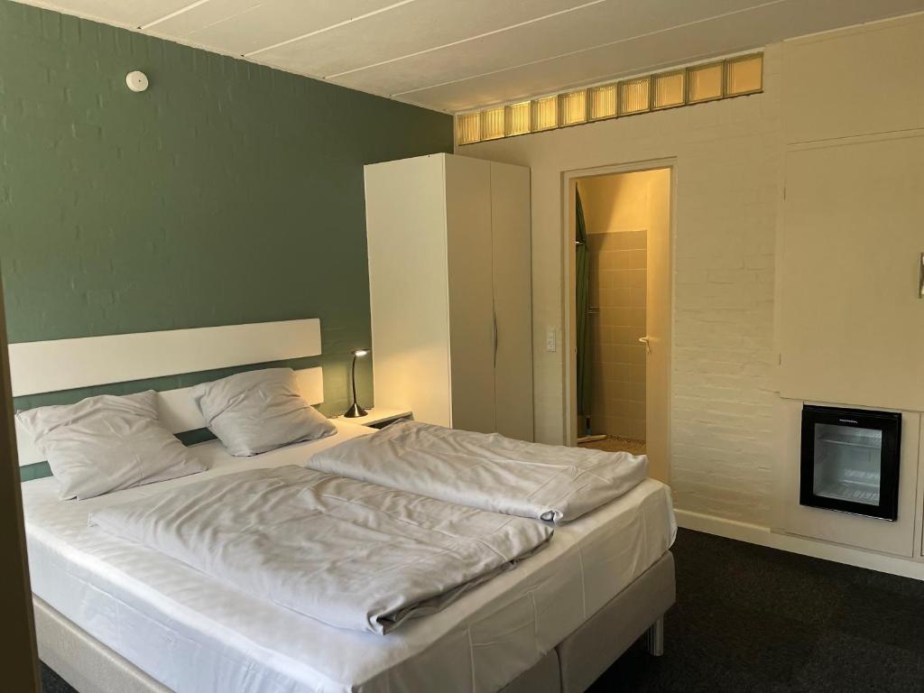 Una cama o camas en una habitación de Motel Rovli