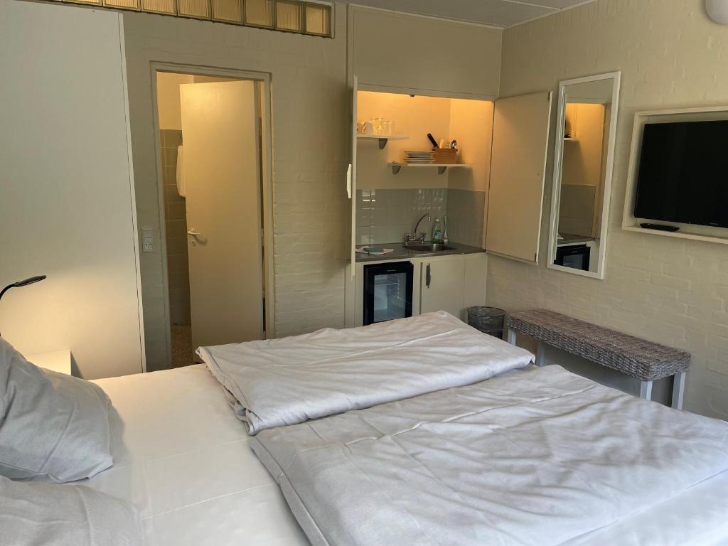 Una cama o camas en una habitación de Motel Rovli