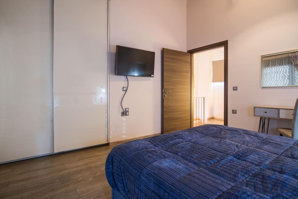 Postel nebo postele na pokoji v ubytování Modern, Stylish Maisonette