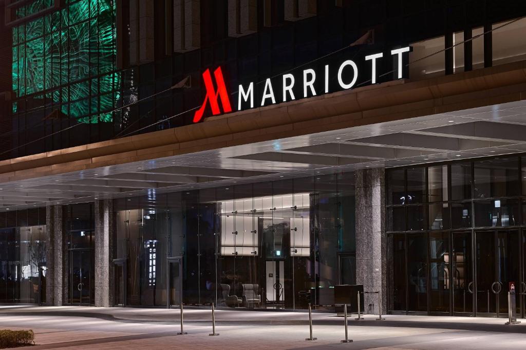 a large building with a marriott sign on it at Taipei Marriott Hotel in Taipei