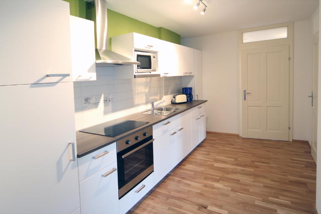 Kuchyň nebo kuchyňský kout v ubytování Gala Apartments - Country Oasis in Pettenbach