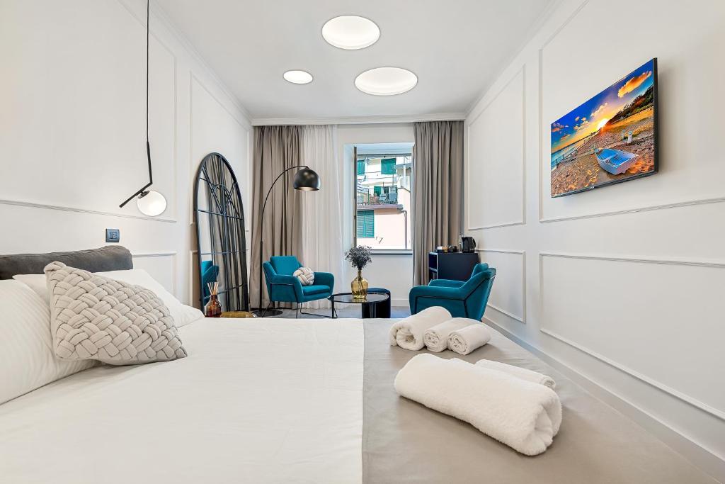Postel nebo postele na pokoji v ubytování EC Luxury Rooms