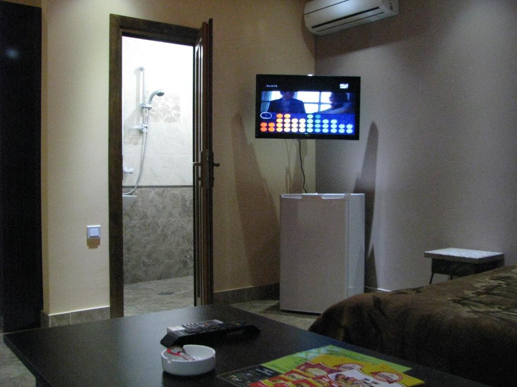 TV a/nebo společenská místnost v ubytování Princ Plaza Hotel